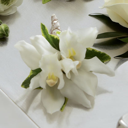 White Mini Cymbidium Boutonniere – PICKET FENCE FLORAL & DESIGN, Holland MI
